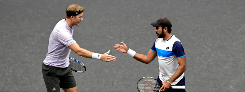 Dominic Inglot and Aisam-ul-Haq Qureshi celebrate after winning a point